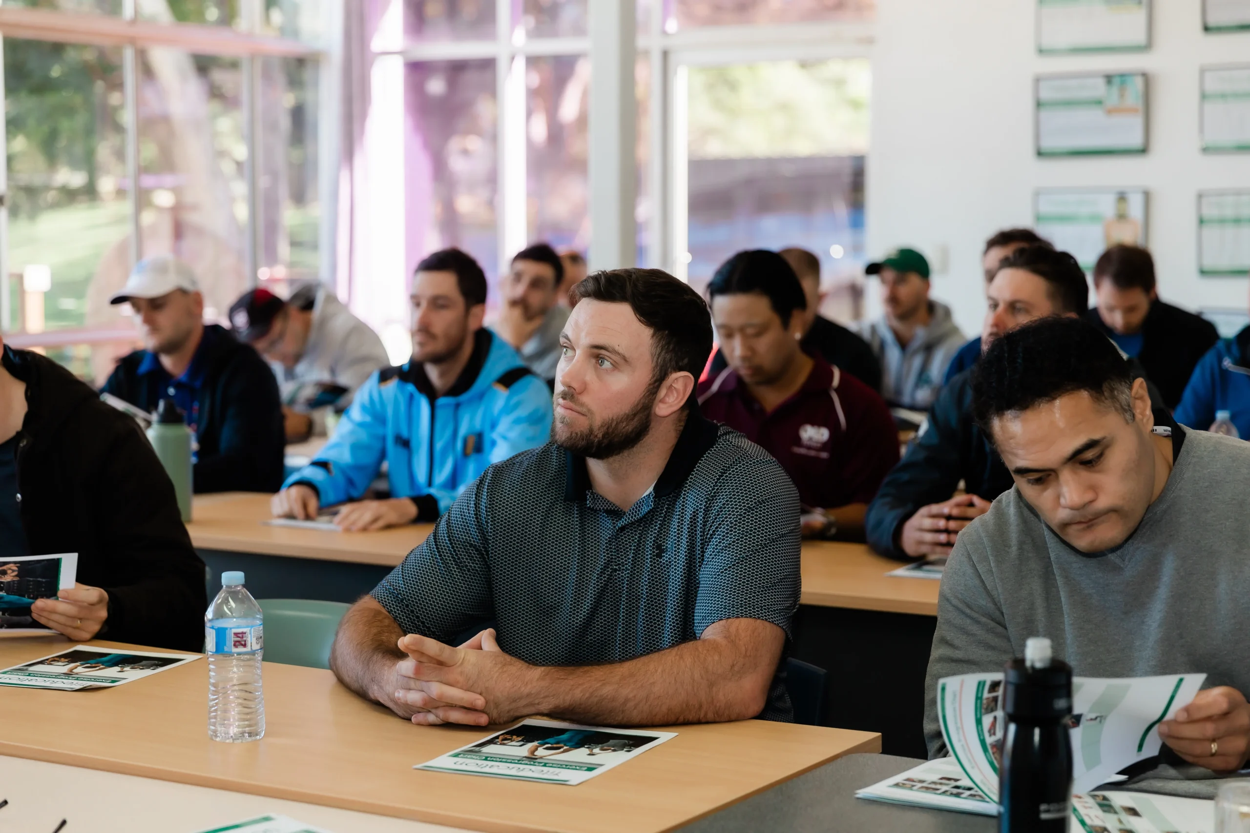 Group of fitness students focused in class